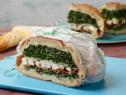 Food Network Kitchen’s Grilled Chicken and Kale Caesar Pressed Sandwich for Summer Slow Cooker/Zucchini Fries/Picnic Brick-Pressed Sandwiches, as seen on Food Network.