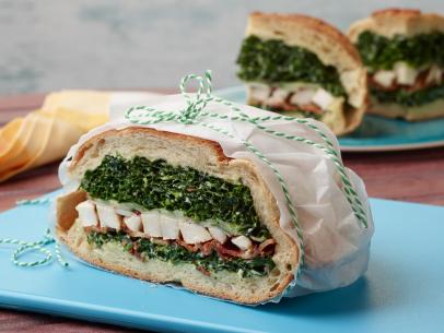 Food Network Kitchen’s Grilled Chicken and Kale Caesar Pressed Sandwich for Summer Slow Cooker/Zucchini Fries/Picnic Brick-Pressed Sandwiches, as seen on Food Network.