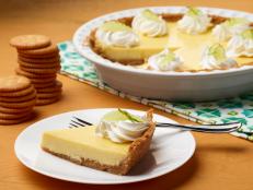 Food Network Kitchen’s Key Lime Pie with Butter Cracker Crust for Summer Slow Cooker/Zucchini Fries/Picnic Brick-Pressed Sandwiches, as seen on Food Network.