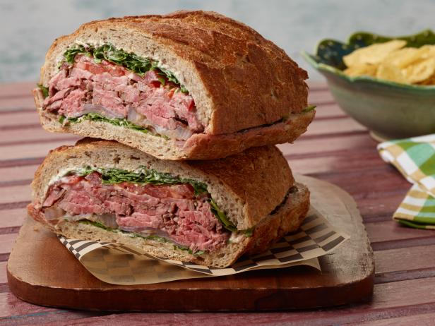 Food Network Kitchen’s Steak and Horseradish Pressed Sandwich for Summer Slow Cooker/Zucchini Fries/Picnic Brick-Pressed Sandwiches, as seen on Food Network.