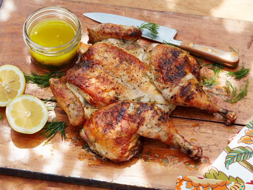 Food Network Kitchen’s Grilled Spatchcocked Greek Chicken as seen on Food Network.
