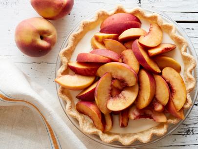 Food Network Kitchen’s 4Ingredient Peaches and Cream Pie as seen on Food Network.