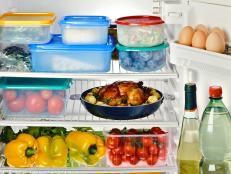 Open Refrigerator with Assortment of Food and Beverages