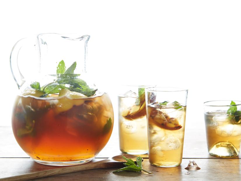 Food Network Kitchen's Grilled Peach Iced Tea, as seen on Food Network.