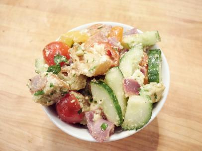 Contestant Martita Jara's dish, Summer Citrus and Avocado Panzanella, for the Star Challenge: Cook Live, as seen on Food Network Star, Comeback Kitchen.