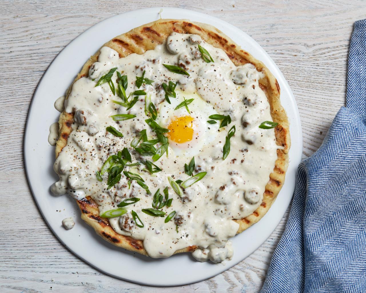 https://food.fnr.sndimg.com/content/dam/images/food/fullset/2016/5/12/0/RX-Lipton_Grilled-Breakfast-Pizza-with-Sausage-Gravy_s4x3.jpg.rend.hgtvcom.1280.1024.suffix/1463151569358.jpeg