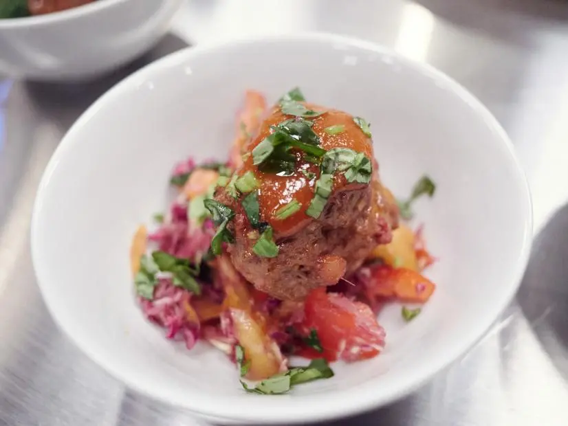 Finalist Martita Jara's dish, Beef and Chorizo with Spicy Mango BBQ Sauce Over Red Pepper Ginger Slaw, for the Mash Up Star Challenge theme, Meatloaf and Pad Thai, as seen on Food Network Star, Season 12.