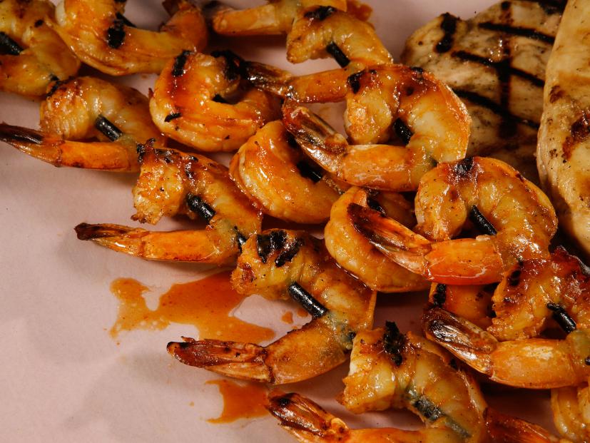 Sweet and spicy shrimp are displayed during an episode about eleven ways to win at summer, as seen on Food Network's The Kitchen Sink, Season 1.