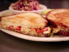 There's a little something for everyone at the Tin Shed Garden Cafe. Guy devoured their ooey-gooey (and vegetarian) heartless artichoke grilled cheese. For a heartier bite, try the juicy pulled-pork barbacoa sliders or the Baby Beluga black curry lentils, available vegan or gluten-free.