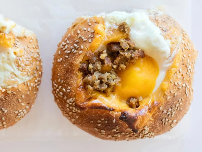 Bacon egg and cheese inside a kaiser roll for breakfast