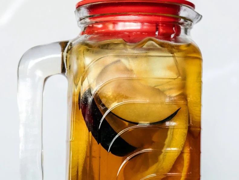 sangria made with iced tea citrus fruit and white wine.