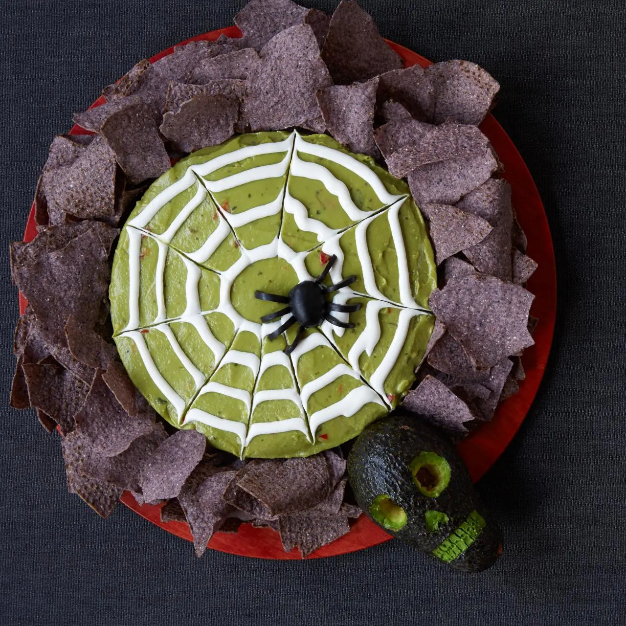 https://food.fnr.sndimg.com/content/dam/images/food/fullset/2016/6/29/0/FN_schaeffer-platters-Spider-Guacamole_s4x3.jpg.rend.hgtvcom.1280.1280.suffix/1507579280647.webp