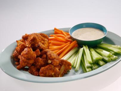 BBQ cauliflower wings are displayed during an episode about what to eat now, as seen on Food Network's The Kitchen Sink, Season 1.