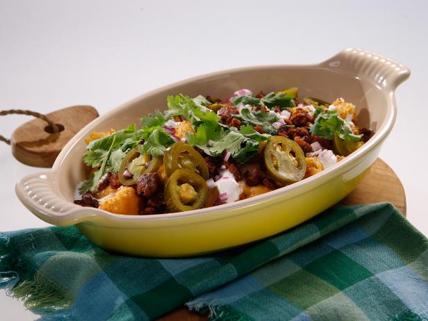 Totchos are displayed during an episode about what to eat now, as seen on Food Network's The Kitchen Sink, Season 1.