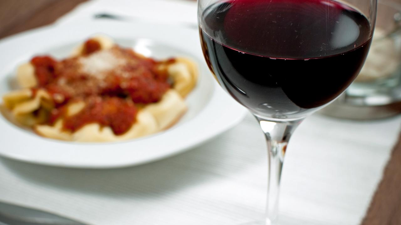 https://food.fnr.sndimg.com/content/dam/images/food/fullset/2016/7/25/0/FN_istock_red-wine-with-pasta-in-background_s4x3.jpg.rend.hgtvcom.1280.720.suffix/1469513255936.jpeg