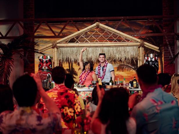 Finalists Tregaye Fraser and Damiano Carrara during the Star Challenge, Tiki Takeover, as seen on Food Network Star, Season 12.