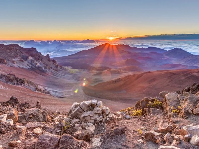 sunrise from the summit of Haleakala volcano on the tropical  island of Maui, Hawaii