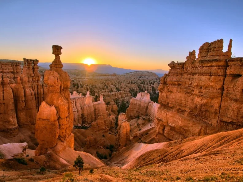 The sun rising above Thor's Hammer at Bryce Canyon National Park, Utah.