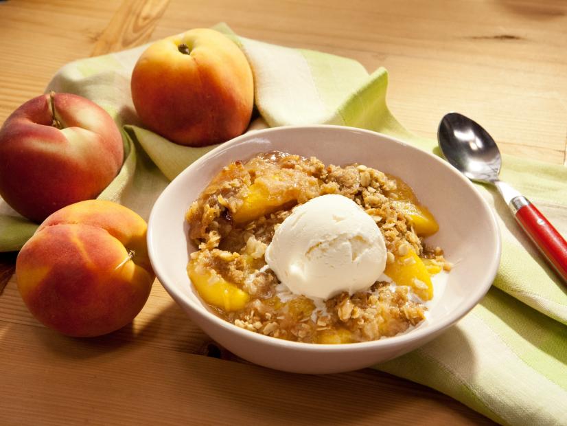 Host Katie Lee's Peach Crisp dessert, as seen on Food Network's The Kitchen, Season 10.