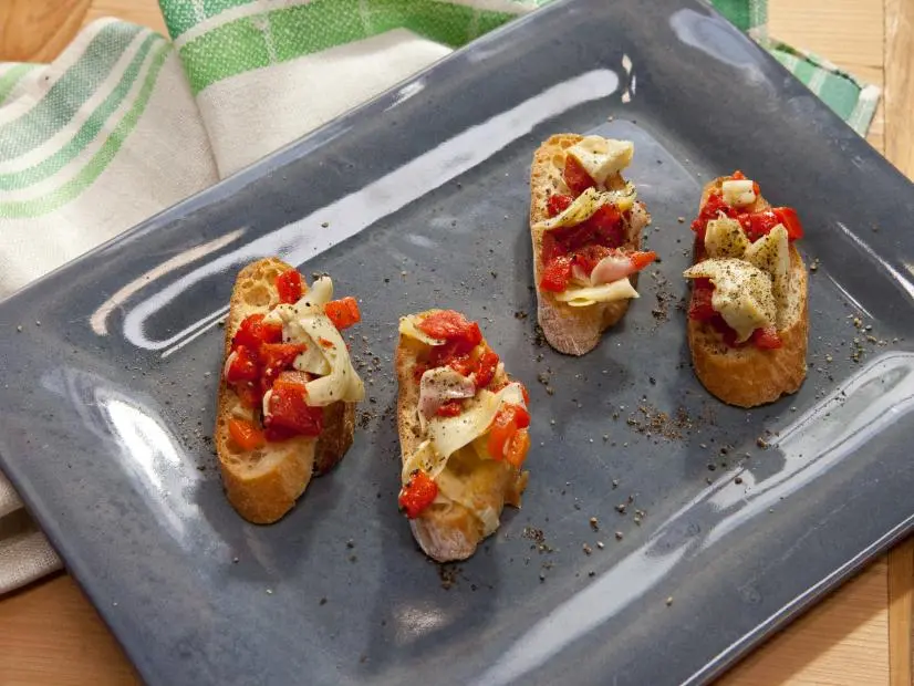 Host Jeff Mauro's Roasted Pepper and Artichoke Bruschetta, as seen on Food Network's The Kitchen, Season 11.