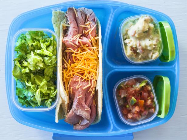 Food Network Kitchens recipe for a quick and easy taco lunch to go. 