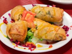 Guy couldn&rsquo;t visit North Carolina without getting a taste of low-country cooking, so he made a beeline for this down-home Southern restaurant. Guy tried the Soul Roll, an egg roll wrap that comes stuffed with adobo-laced collard greens, black-eyed peas, seasoned rice and diced fried chicken. &ldquo;This is a soul food missile pop &hellip; with everything combined in one easy-to-eat bite,&rdquo; Guy declared of the dish.
