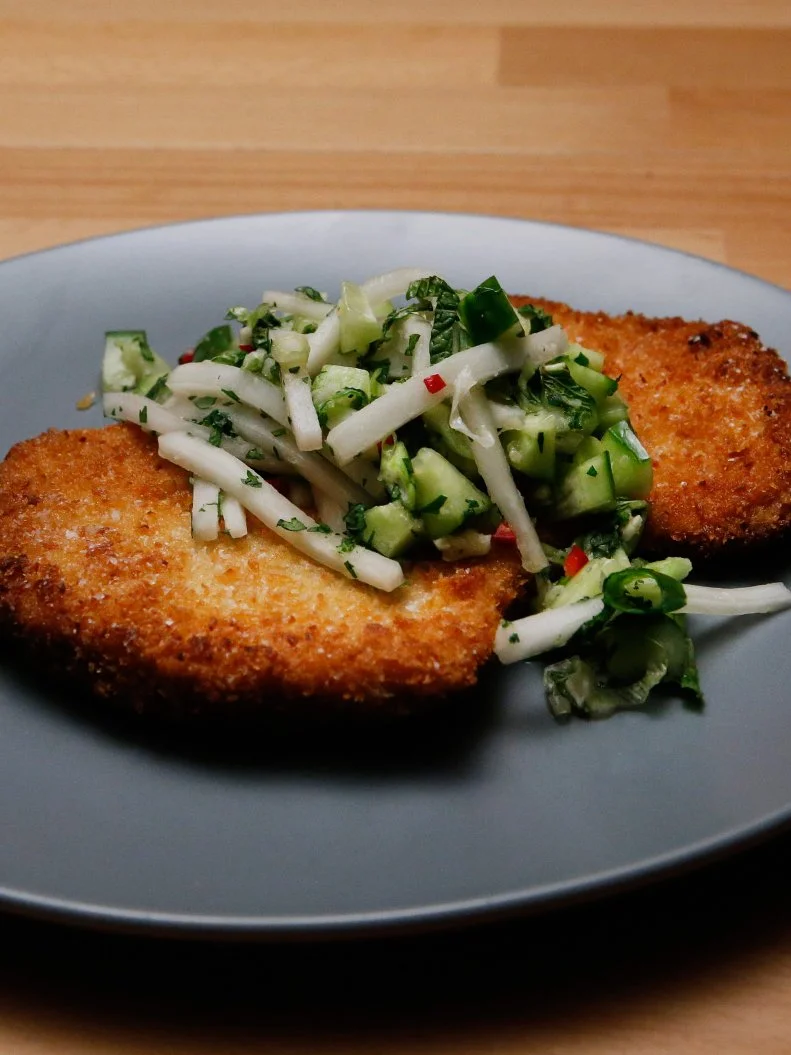 Mentor Anne Burrell's version of a Pork Cutlet with Salsa is displayed, as seen on Food Network's Worst Cooks in America, Season 9.