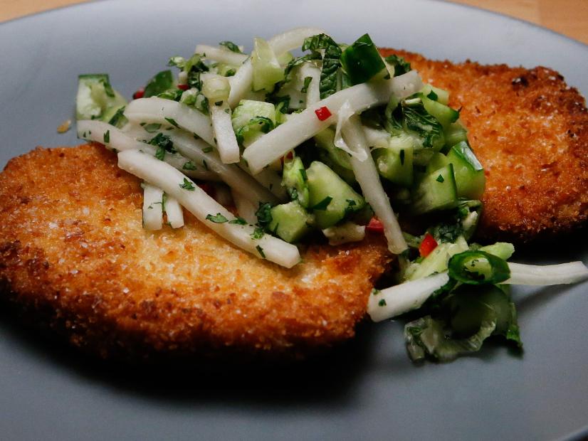Mentor Anne Burrell's version of a Pork Cutlet with Salsa is displayed, as seen on Food Network's Worst Cooks in America, Season 9.