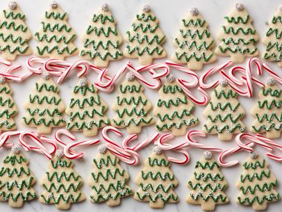 Food Network Kitchen's Minty Christmas Tree Cutout Cookies from 12 Days of Cookies for THE ULTIMATE FRIENDSGIVING/12 DAYS OF COOKIES/LAST-MINUTE SIDES, as seen on Food Network