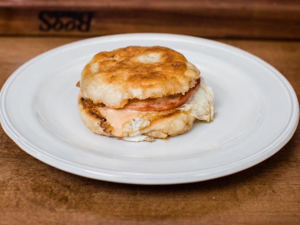 Eggs-in-a-Hole Benedict with Roasted Garlic and Tomato Hollandaise