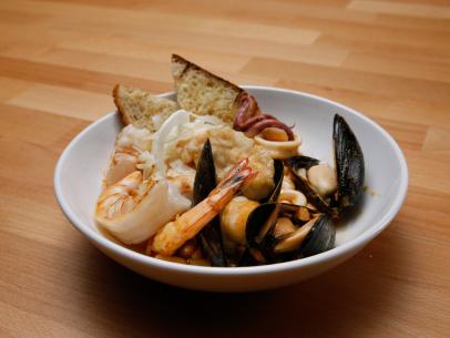 Mentor Anne Burrell's Seafood Been Stew is displayed, as seen on Food Network's Worst Cooks in America, Season 9.