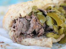 For more than 30 years, Jeff Mauro's favorite place to get an Italian beef sandwich has been Johnnie's Beef in Elmwood Park near Chicago. The thin-sliced roast beef is dripping in au jus and topped with sweet peppers, creating a hot and juicy sandwich that has been a local favorite for decades.