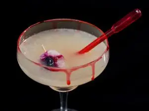 HGTV's Drew Scott and Food Network's Tia Mowry chose a lychee mocktail for their halloween drink, as seen during the 2016 All Star Halloween Spectacular. (after)