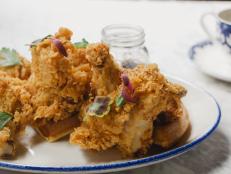 Ted Allen counts down the days until he can have Chef Art Smith's famous fried chicken, which is only served on Sundays. The juicy and flavorful chicken is brined for 3 days before it's dredged in an amalgam of secret spices and fried. If you're feeling hungry, order some mac and cheese as well.