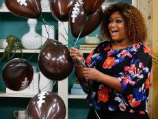 Host Sunny Anderson demonstrates Touchdown Touches, as seen on Food Network's The Kitchen, Season 12.