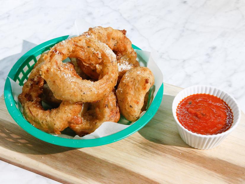 A Pizza Onion Ring Mashup is displayed, as seen on Food Network's The Kitchen Sink, Season 2.