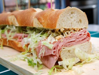 The Giant Mortadella Sub section of the Go Long! Sandwich is displayed, as seen on Food Network's The Kitchen, Season 12.
