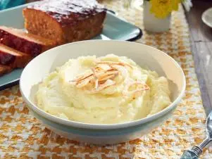 Host Tiffani Amber Thiessen's dish, Garlic Mashed Potatoes with Crispy Fried Shallots, as seen on Cooking Channel’s Dinner at Tiffani’s, Season 3.