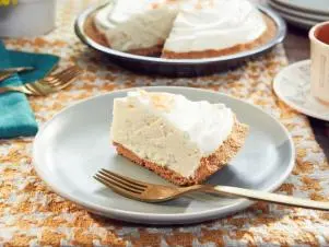 Host Tiffani Amber Thiessen's dish, Grapefruit Chiffon Pie, as seen on Cooking Channel’s Dinner at Tiffani’s, Season 3.