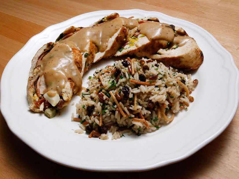 Mentor Rachael Ray's Chicken Roulade with Rice Pilaf dish is displayed, as seen on Food Network's Worst Cooks in America, Season 10.