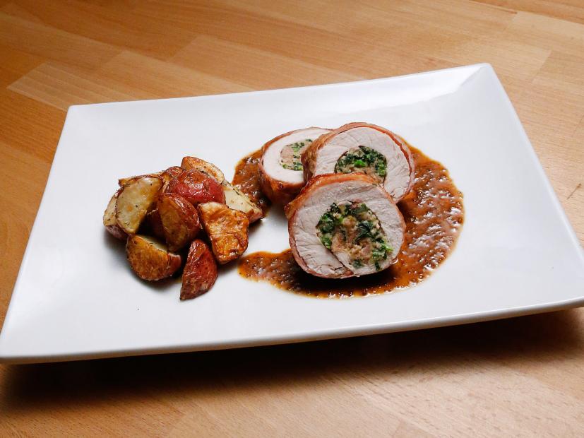 Mentor Anne Burrell's Pork Roulade with Roasted Red Potatoes dish is displayed, as seen on Food Network's Worst Cooks in America, Season 10.