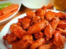 <p>Anchor Bar claims the invention of the Buffalo wing, tossed and sauced in "Frank and Teressa's Original Sauce" and served with a side of Bleu cheese and celery.</p>