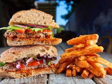 <p>Most people probably wouldn't expect to find amazing food at a restaurant connected to a car wash and a laundromat, but The Cove in San Antonio is home to some of the best lamb burgers Guy's ever had. Owner Lisa Avestas' fish tacos and mushroom quesadillas are hometown favorites.</p>