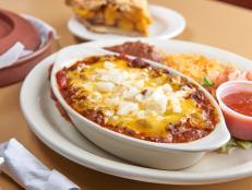 <p>The Tip Top Cafe in San Antonio hasn't changed the menu much since it first opened over 70 years ago, but that's because there hasn&rsquo;t been any reason to do so. Guy couldn't stop eating the open-faced roast pork and gravy sandwich, the beef enchiladas and the buttery fried shrimp.</p>