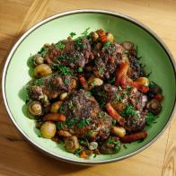 Coq Au Vin is displayed, as seen on Food Network's The Kitchen, Season 12.