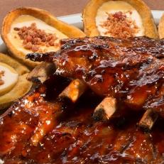 You may not expect it in this tiny Northern Panhandle town not far from Pittsburgh, but the award-winning, fall-off-the-bone, sauce-kissed ribs served in an eclectic tiki bar-meets-sports bar atmosphere lure crowds from around the region. Dee Jay’s BBQ Ribs & Grille serves the ribs with smashed potatoes or cheesy, bacon-topped ’tater skins — which, come to think of it, sounds like a pretty brilliant idea.