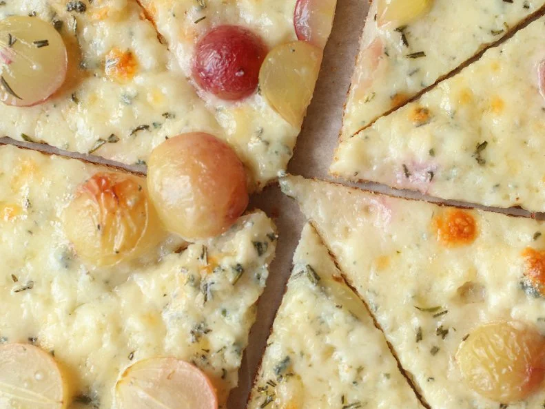 Pizza may not be a West Virginia food staple, but the state has a version of it that stands apart from all the others. A fanatical following has helped Pies & Pints grow into a small regional pizza-and-craft beer chain, and the signature pie has made several national best-of lists. This clever creation features sliced sweet red grapes, creamy Gorgonzola and fresh rosemary on a razor-thin crispy crust. For an extra treat, add bacon — and be sure to ask your server to tell you that variation’s secret name.