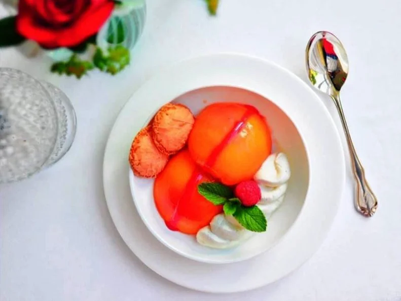 It’s a rare soul who can try this iconic dessert and not then covet it. Greenbrier Peaches come from one of the country’s swankiest resorts, The Greenbrier in White Sulphur Springs, which has hosted royalty, presidents, celebrities and families for decades. Served with vanilla whipped cream, fresh raspberries and a macaroon, Greenbrier Peaches are “A Greenbrier Tradition.” If you’re feeling a little overindulgent, order them with a slice of Toasted Coconut Pound Cake on the side. Divine.