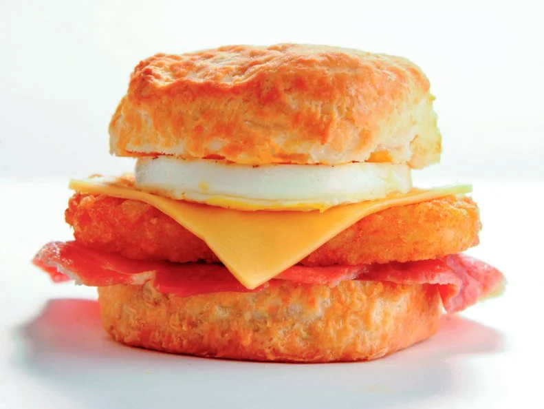 In West Virginia, biscuits are serious business — and biscuit sandwiches are pretty much a mandatory dish. Tudor’s Biscuit World consistently ranks as one of the best purveyors of the buttery pastry in the state and, according to some, the best thing about the Mountain State. Suffice it to say, the state’s namesake Mountaineer Biscuit has reached icon status in the Appalachian region. It's made with country ham, a crispy potato cake, egg and cheese, all cradled inside a flaky bun.