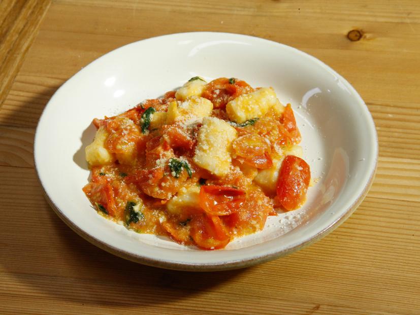 Guest Scott Conant's Gnocchi with Tomato Sauce is displayed, as seen on Food Network's The Kitchen, Season 12.